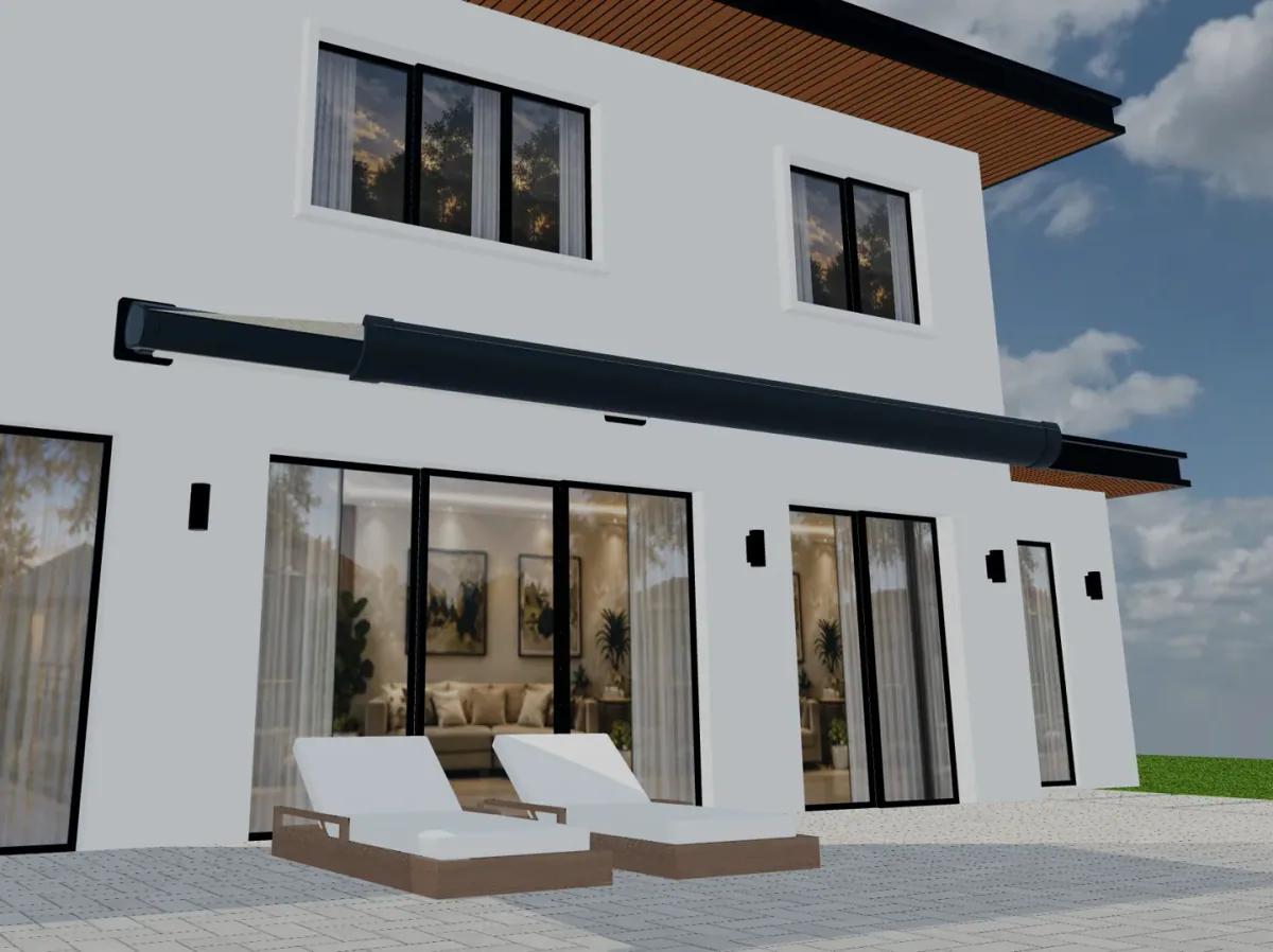 Retracted awning cassette mounted above patio doors on a house exterior